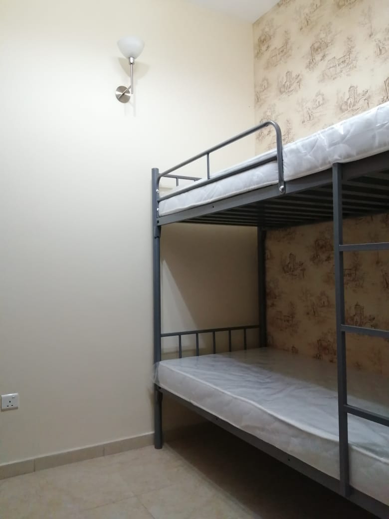 Closed Partition Room With Big Wardrobe, Bunk Bed, And 2 Sharing Bathrooms