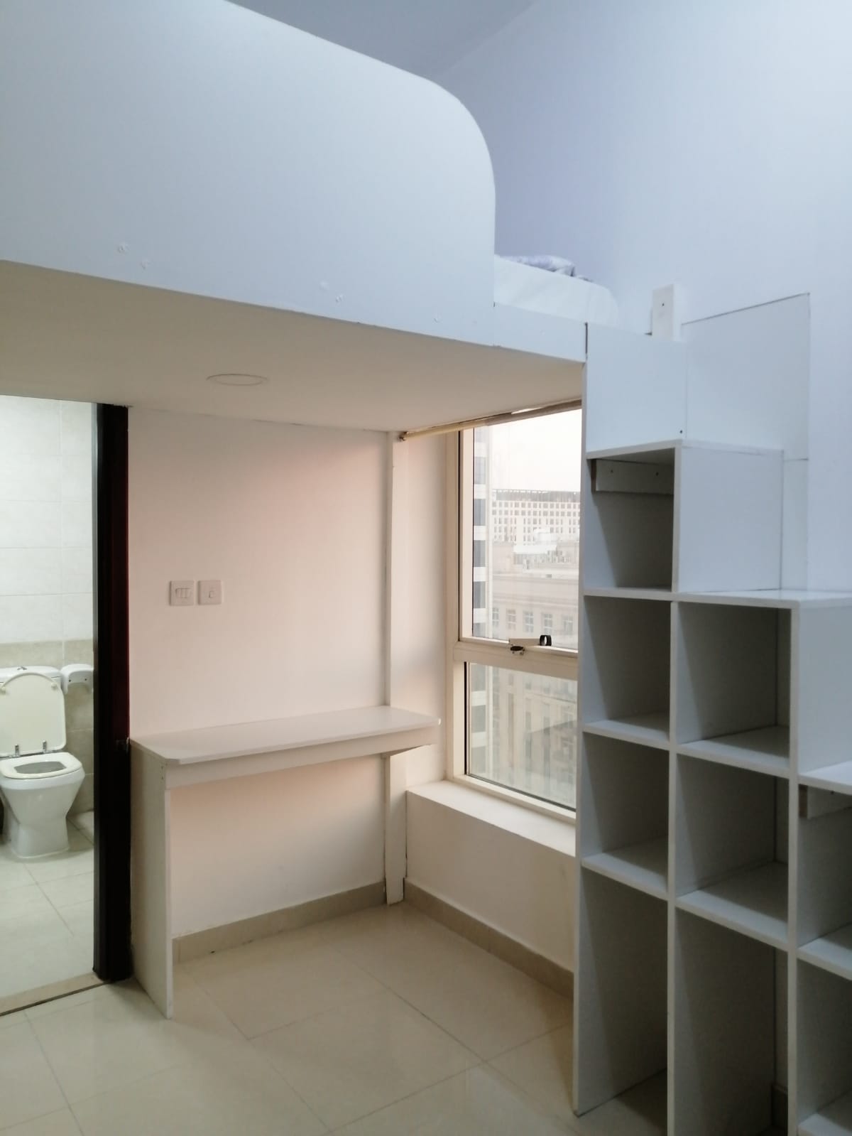 Loft Type Partition Room With Big Window And Attached Bathroom With Bathtub