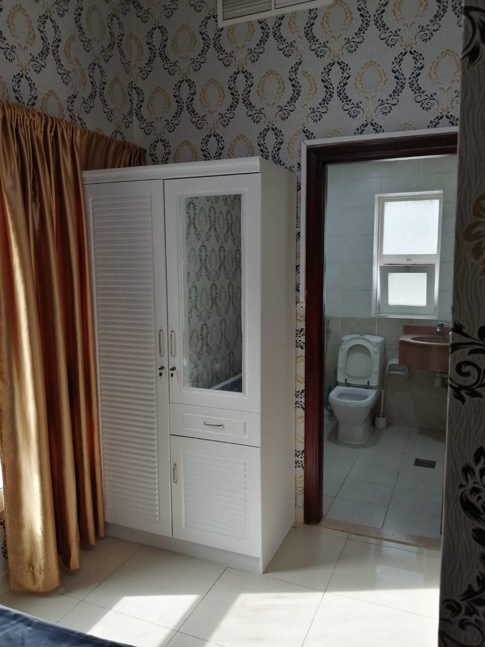 Closed Partition Room With Big Window And Attached Bathroom With Bathtub