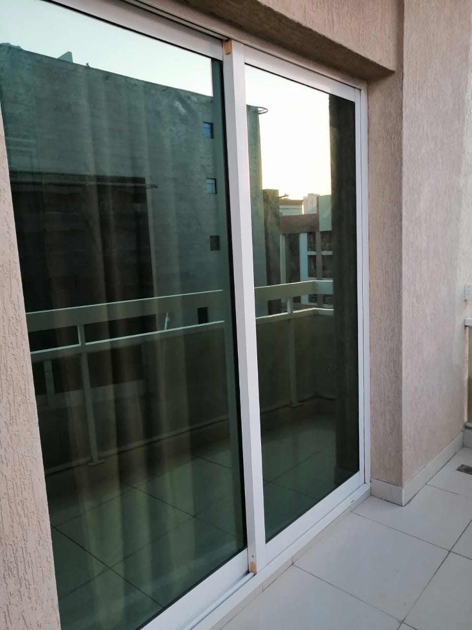 Closed Partition Inside Master Bedroom With Private Balcony And Sharing Full Bathroom