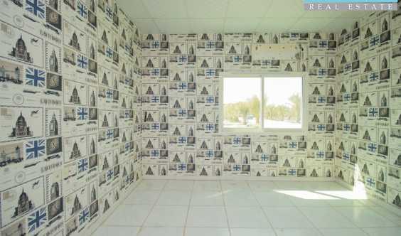 Five Bedroom En Suite Villa Surrounded By Date Palm Trees